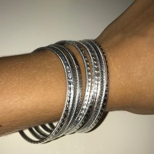 Set of 7 Silver dangle hoop bracelets